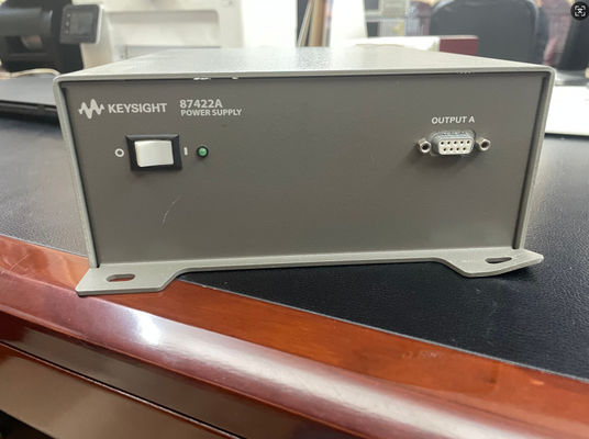 Agilent 87422A Fornecimento de energia pré-utilizado 12VDC 15VDC 70W Com 83017A 0275 e corrente de modo normal 4 mArms